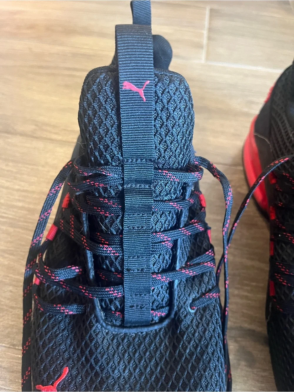 Puma Black Sneakers with Red Accent Logos